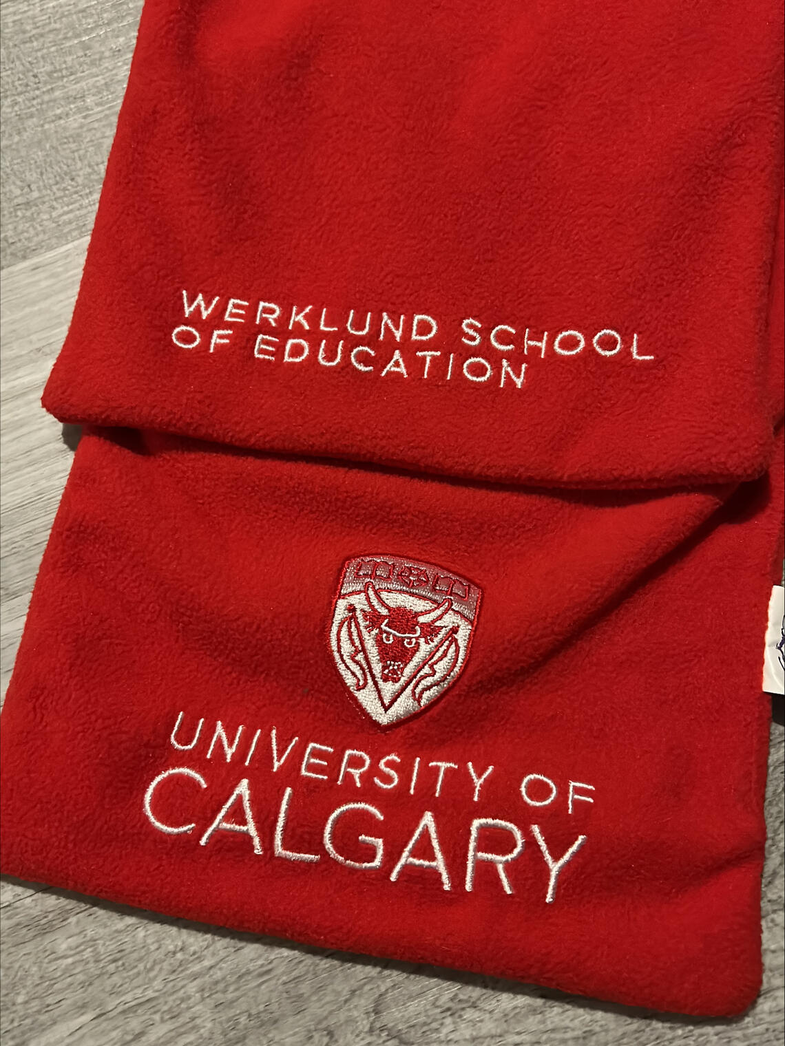 red scard branded with UCalgary's Werklund School of Education