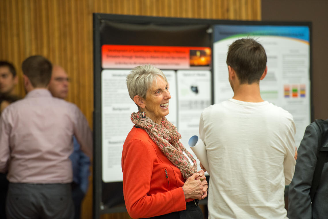 Irene Herremans teaches the capstone research course and supervises students in the Master of Sustainable Energy Development program. Here, she engages with attendees at the 2018 Sustainable Energy Development Student Research Showcase.