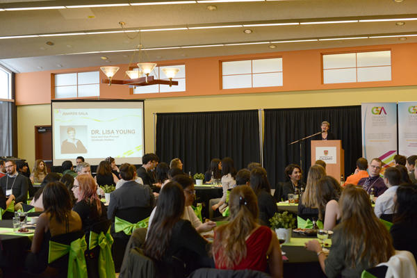 Lisa Young, dean of the Faculty of Graduate Studies, presents at the GSA awards gala. 