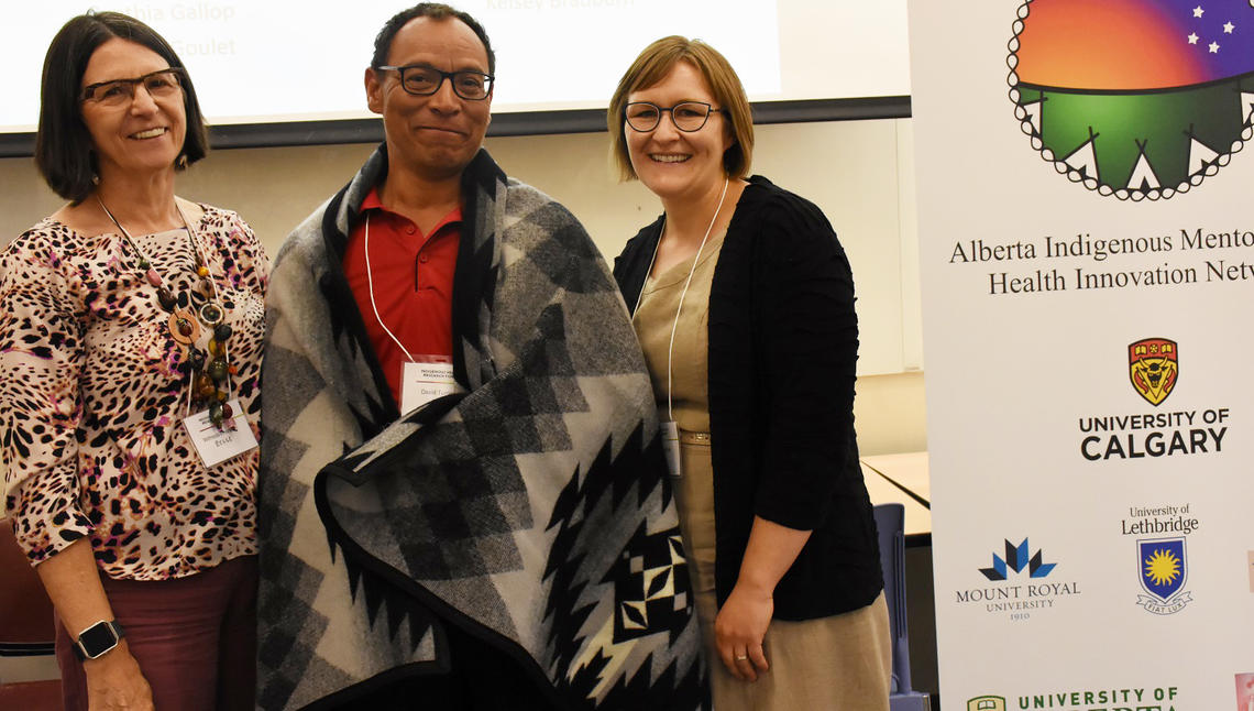 It was also a chance to thank David Turner, GRIP's outgoing co-chair, seen here with Wilfreda Thurston and Dr. Cheryl Barnabe, for all his contributions.