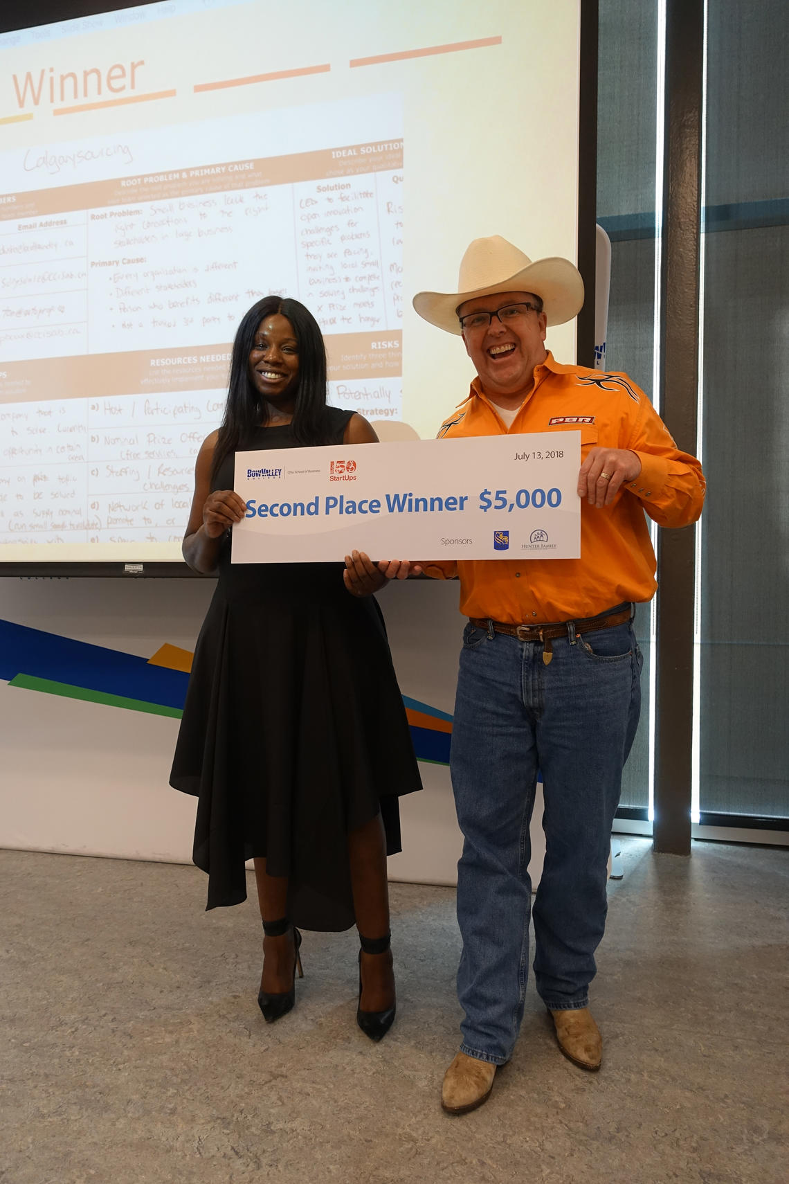 Erica Hughes, founder of CareFind and second-place winner in the Innovation Rodeo Finals, with Craig Elias, Entrepreneur in Residence at Bow Valley College and the "chief wrangler" of the event.
