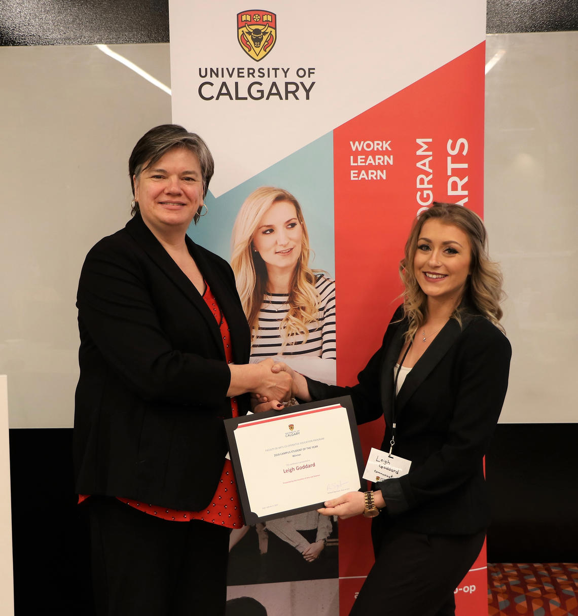 Pascale Sicotte, vice-dean of arts, presents Leigh Goddard with her certificate for winning Student of the Year working for an on-campus office. Goddard was nominated by her employer, Lies Thompson, for her excellent work done during her co-op placement in the Undergraduate Science Centre.