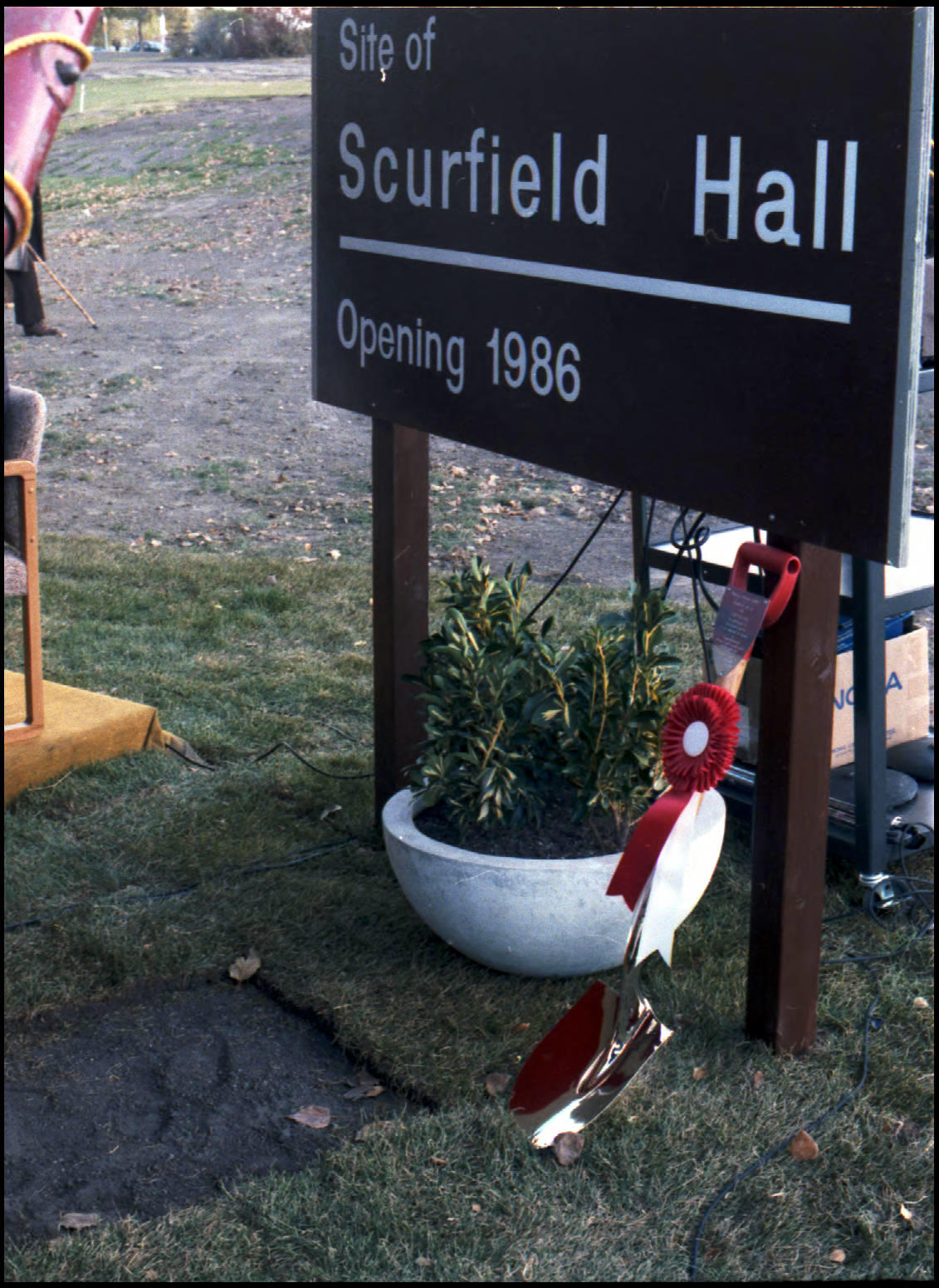 A sign designating the site of Scurfield Hall during the sod turning ceremony