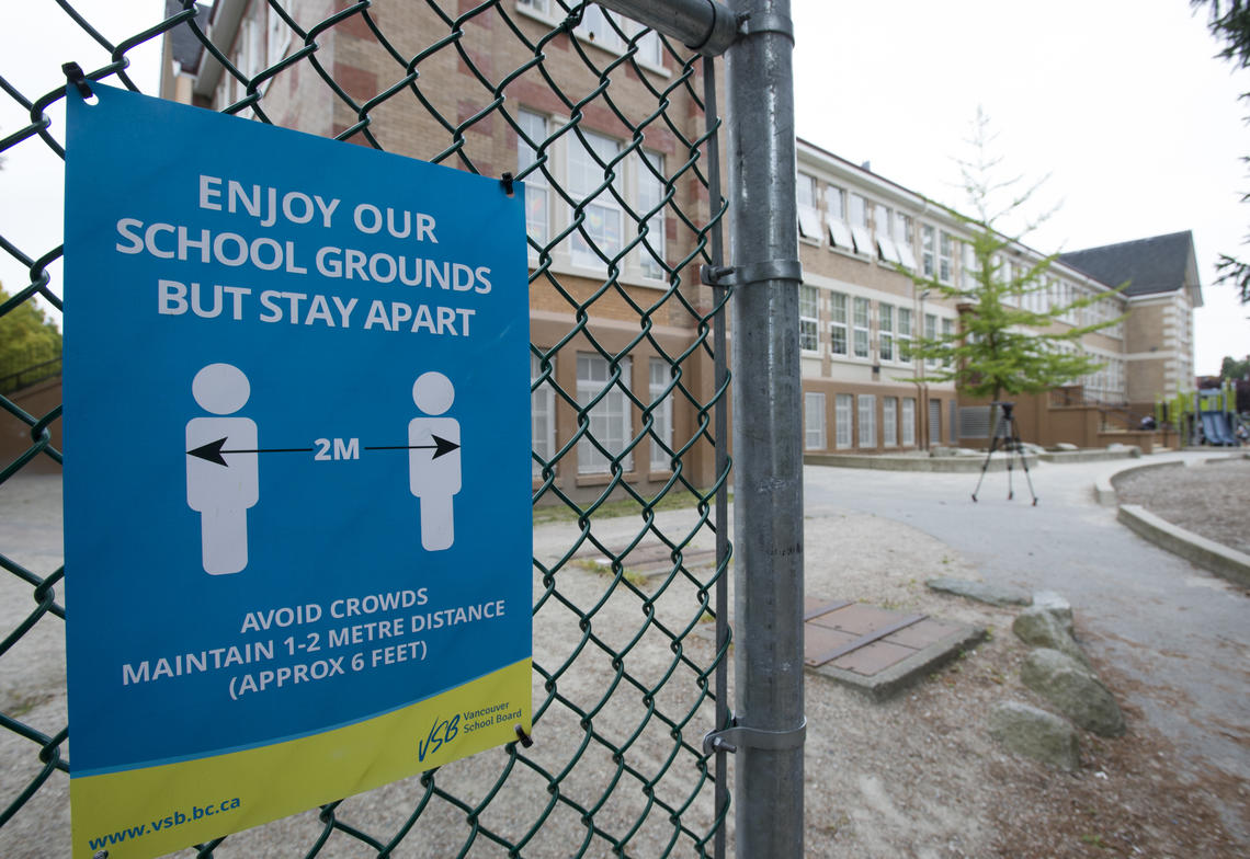 A physical distancing sign is seen at Hastings Elementary school in Vancouver, Sept. 2, 2020.