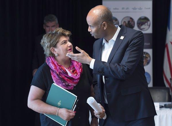 Gudie Hutchings chats with Liberal cabinet minister Ahmed Hussen in Steady Brook, Newfoundland and Labrador.