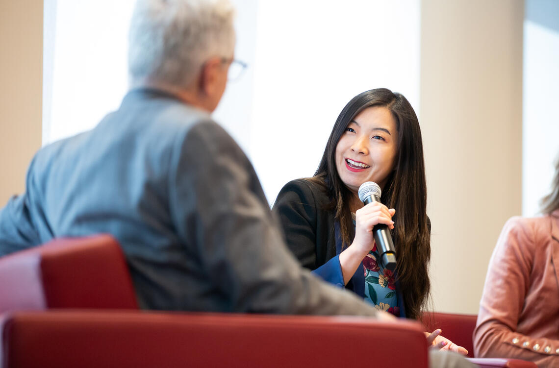 Haskayne alum Jane Zhang, BComm'12, MBA'16 and DBA'26 speaking at the internal brand sneak-a-peek event on April 17.