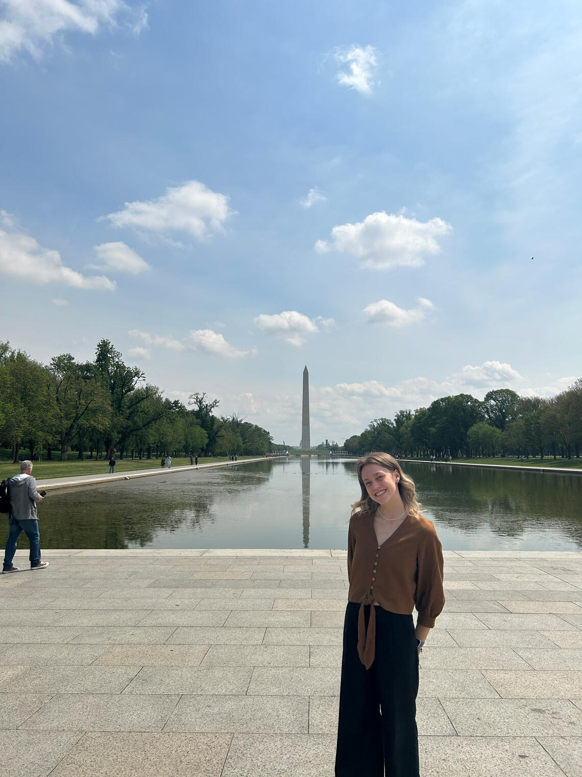 Student in front of a monument