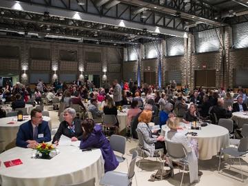 The afternoon of celebrations began with live music, delicious food and over 200 invitees and their guests packing the Mac Hall event space.