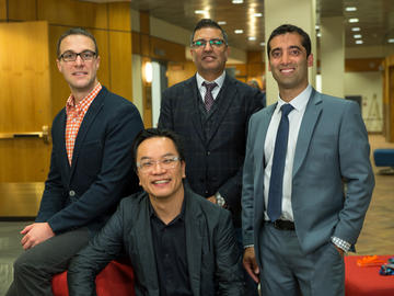 1st Place - Fluid Biotech Inc. Team. Left to right: Casey Smit, P.Eng vice president, operations, Dr. John H. Wong, founder, Rahim Nathu, vice president of business development, Dr. Alim Mitha, founder of Fluid Biotech Inc.