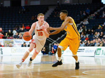 University of Calgary Dinos won a dramatic 79-77 victory over the Ryerson Rams Sunday to clinch their first national title in school history at the USPORTS national championship in Halifax