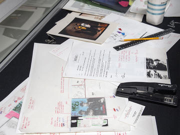 The desk of former Capitol Records-EMI of Canada product manager and in-house designer Ralph Alfonso imagined circa 1990