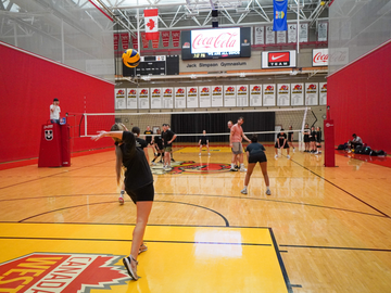 Students play intramural volleyball as part of a student league. 