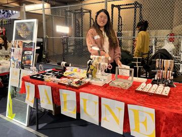 Vendor at the Oval's holiday market