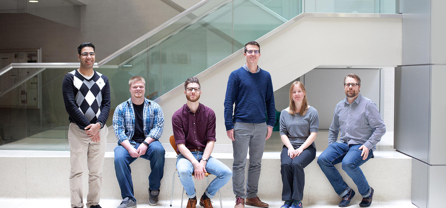 From left, University of Calgary trainees at the Hotchkiss Brain Institute (HBI) Khalil Rawji, James Rogers, Samuel Jensen, Michael Keough, Erin Stephenson, and Jason Plemel. Led by Keough, under the supervision of V. Wee Yong, the team recently published a study identifying a mechanism by which myelin, the protective covering surrounding nerve cells, can repair itself in multiple sclerosis lesions. Photos by Janelle Pan