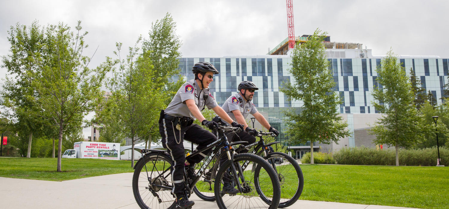 More than 80 per cent of Campus Security Survey respondents reported feeling either generally safe or very safe at the University of Calgary. Campus Security's Tesha Lingren, left, and Jean Beaudoin on bike patrol. Photo by Riley Brandt, University of Calgary 