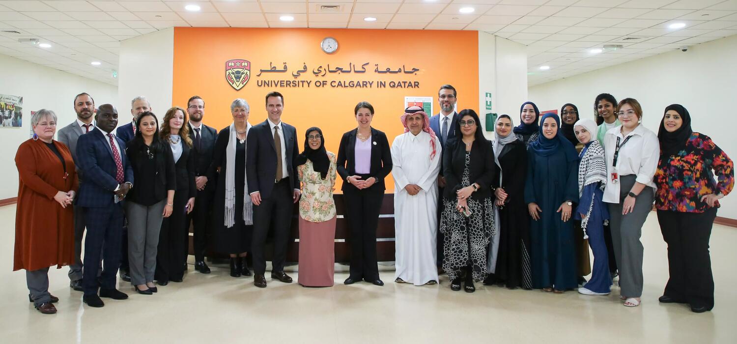 Danielle Smith with students and employees of the University of Calgary in Qatar