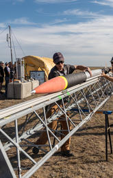 An aerospace engineering team from the Schulich School of Engineering prepares their custom-designed rocket for a test launch. 