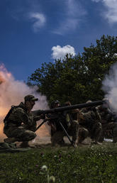 Ukrainian servicemen shoot with an SPG-9 recoilless gun during training in Kharkiv region, Ukraine, on July 19, 2022