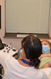 Dr. Kerri Novak with patient 